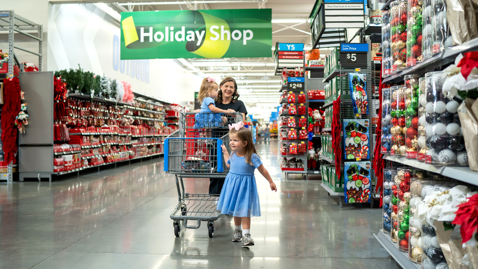 Family in holiday shop
