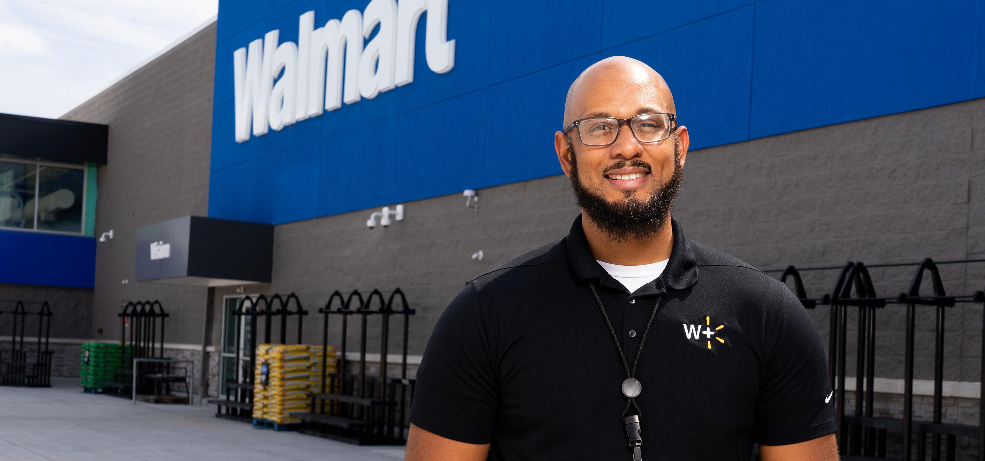 Store Manager Junius Williams stands outside of his new Walmart supercenter in Cypress, Texas.